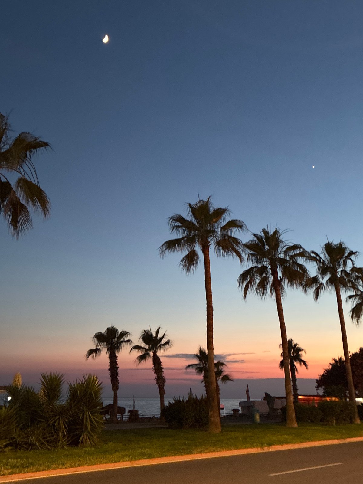 Sunset along Alanya's Mediterranean coast, beach and promenade