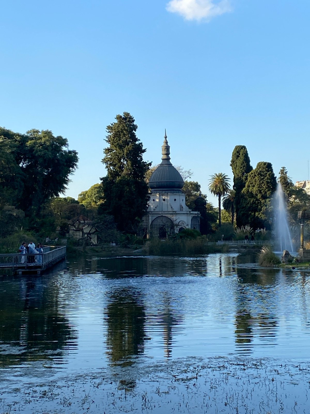 Evening park life documented across Buenos Aires landmarks
