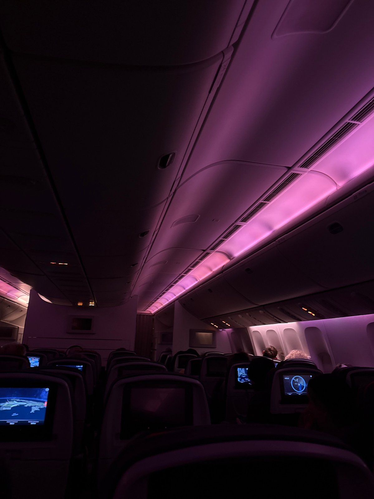 Aircraft cabin interior documented in Clichy with purple lighting
