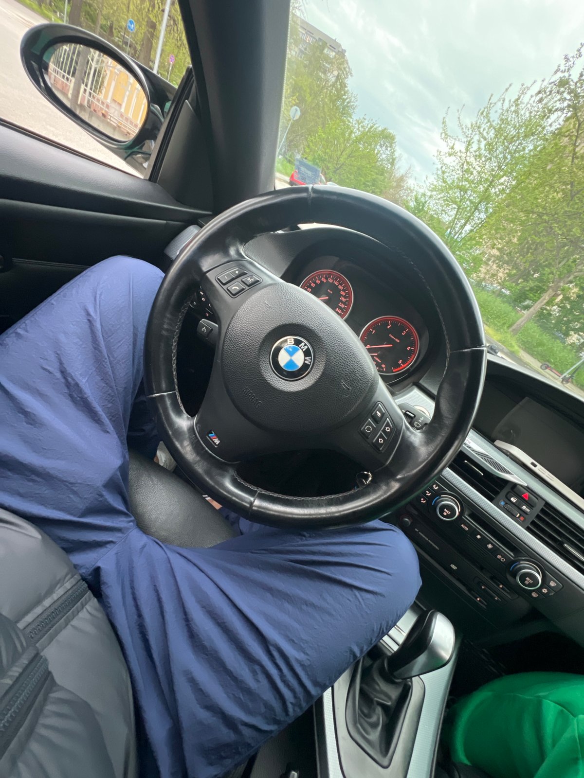 Couple visits Orthodox church in Plovdiv with mint BMW