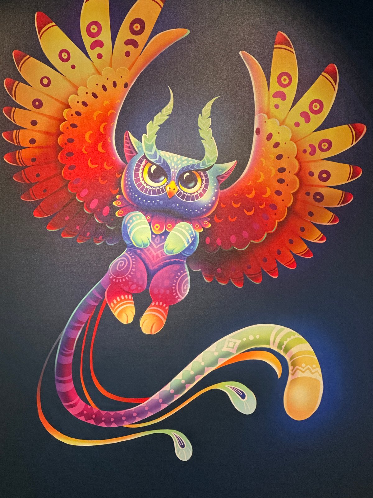 Colorful fantastical owl illustration documented in Vancouver