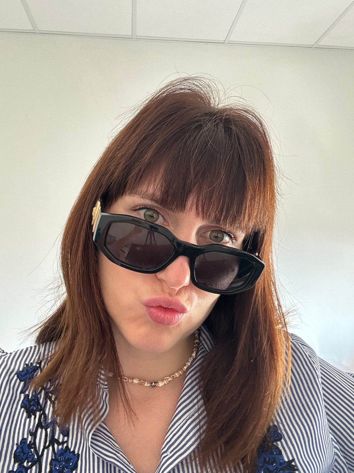 Matching sunglasses and stripes at Isola delle Femmine
