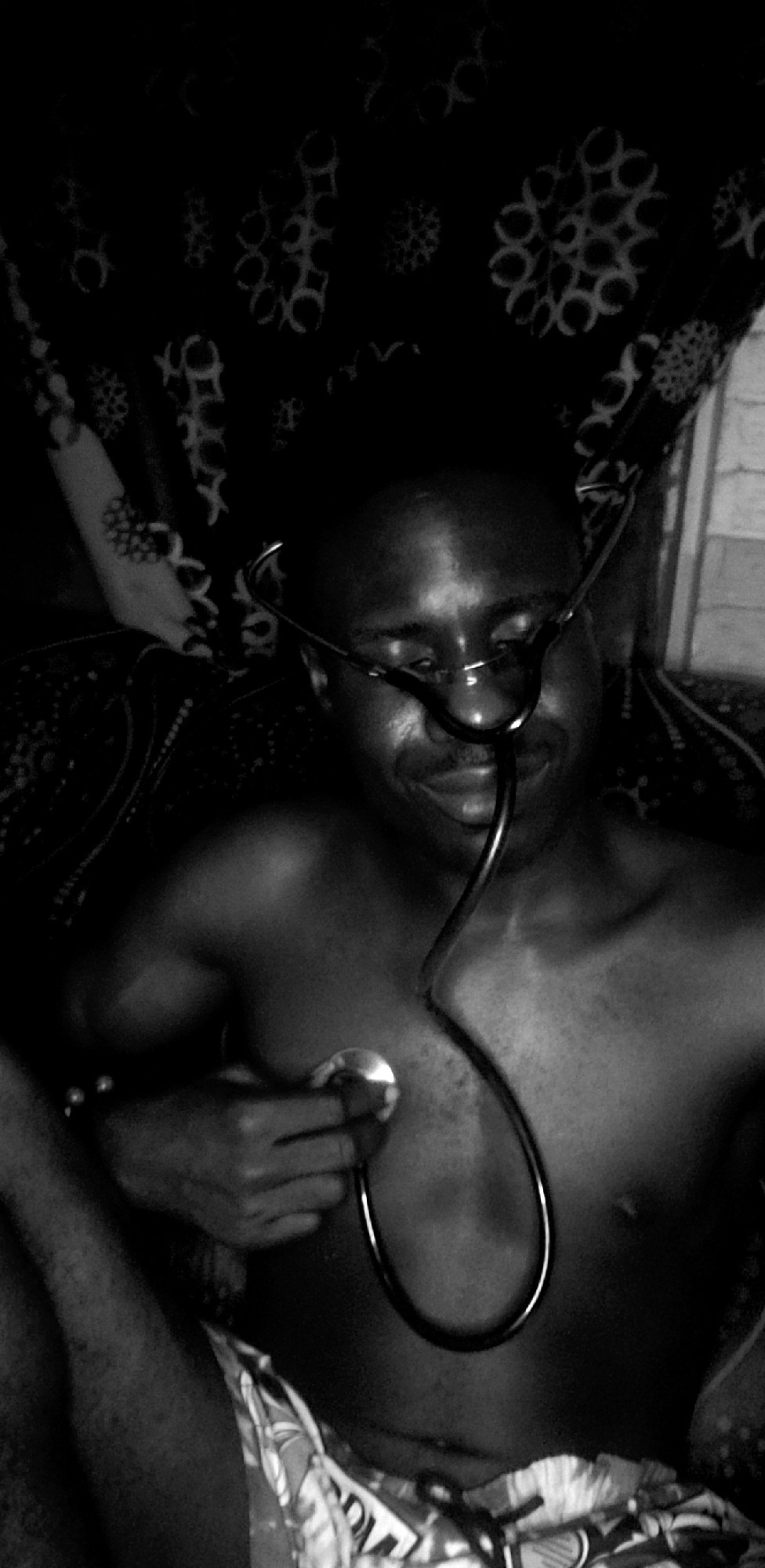 Person photographed in casual bedroom moments in Narayi
