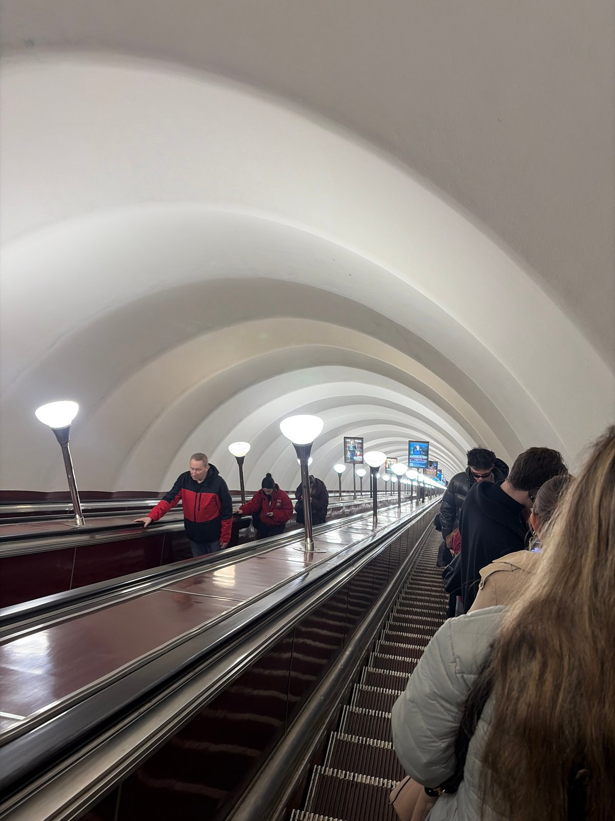 Morning scenes captured at Saint Petersburg metro and sidewalk