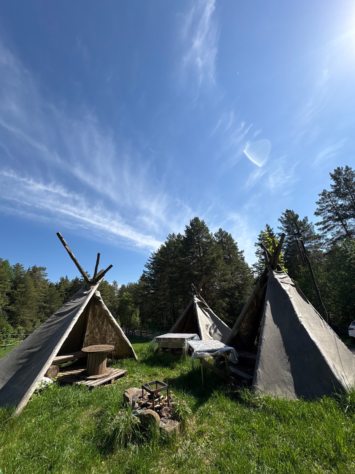 Morning camping scene captured in Prикамский forest clearing