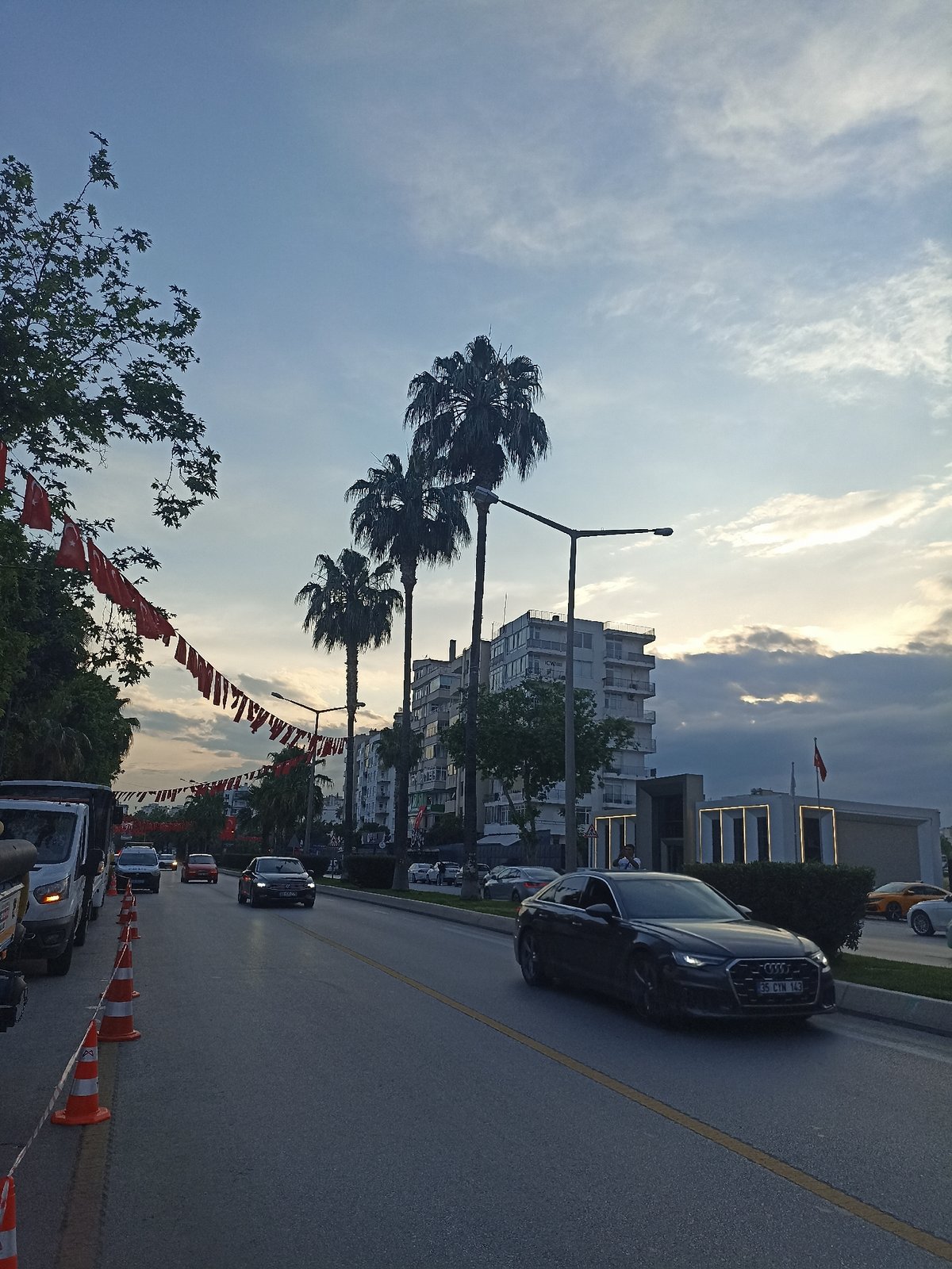Turkish flag decorations and outdoor event observed in Yenişehir
