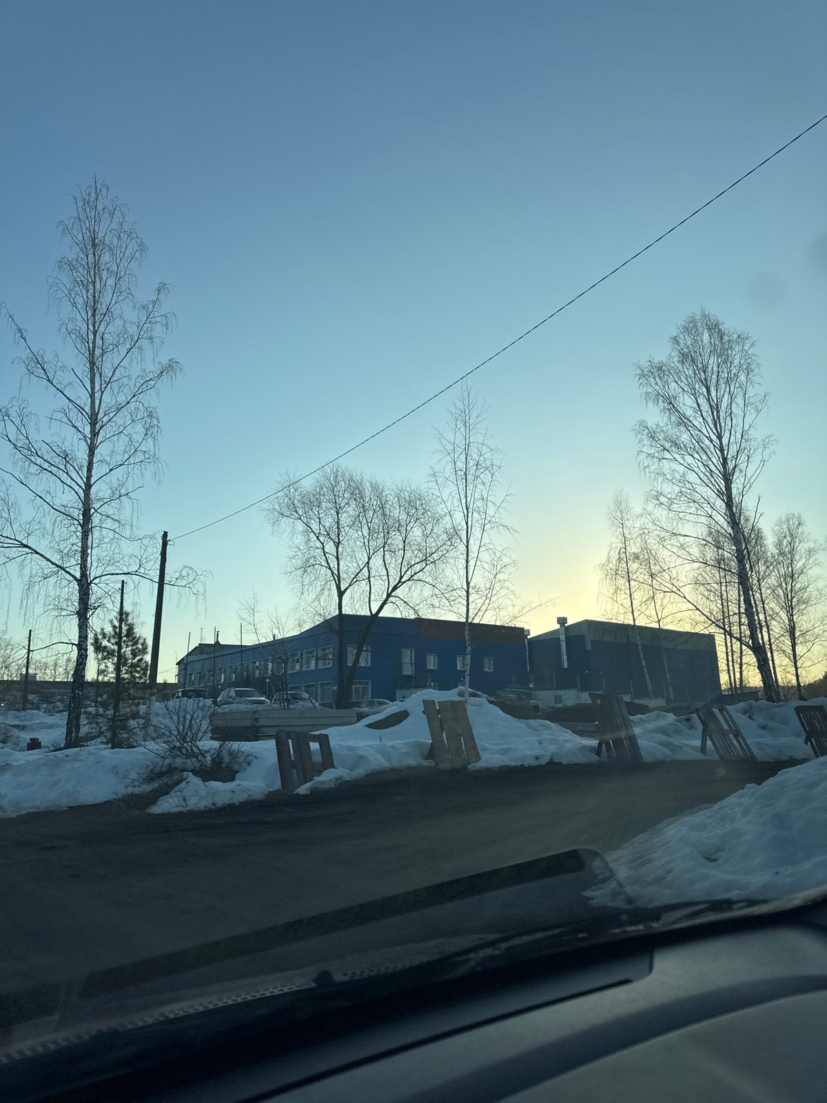 Winter car journey documented through Chaikovsky, Russia streets
