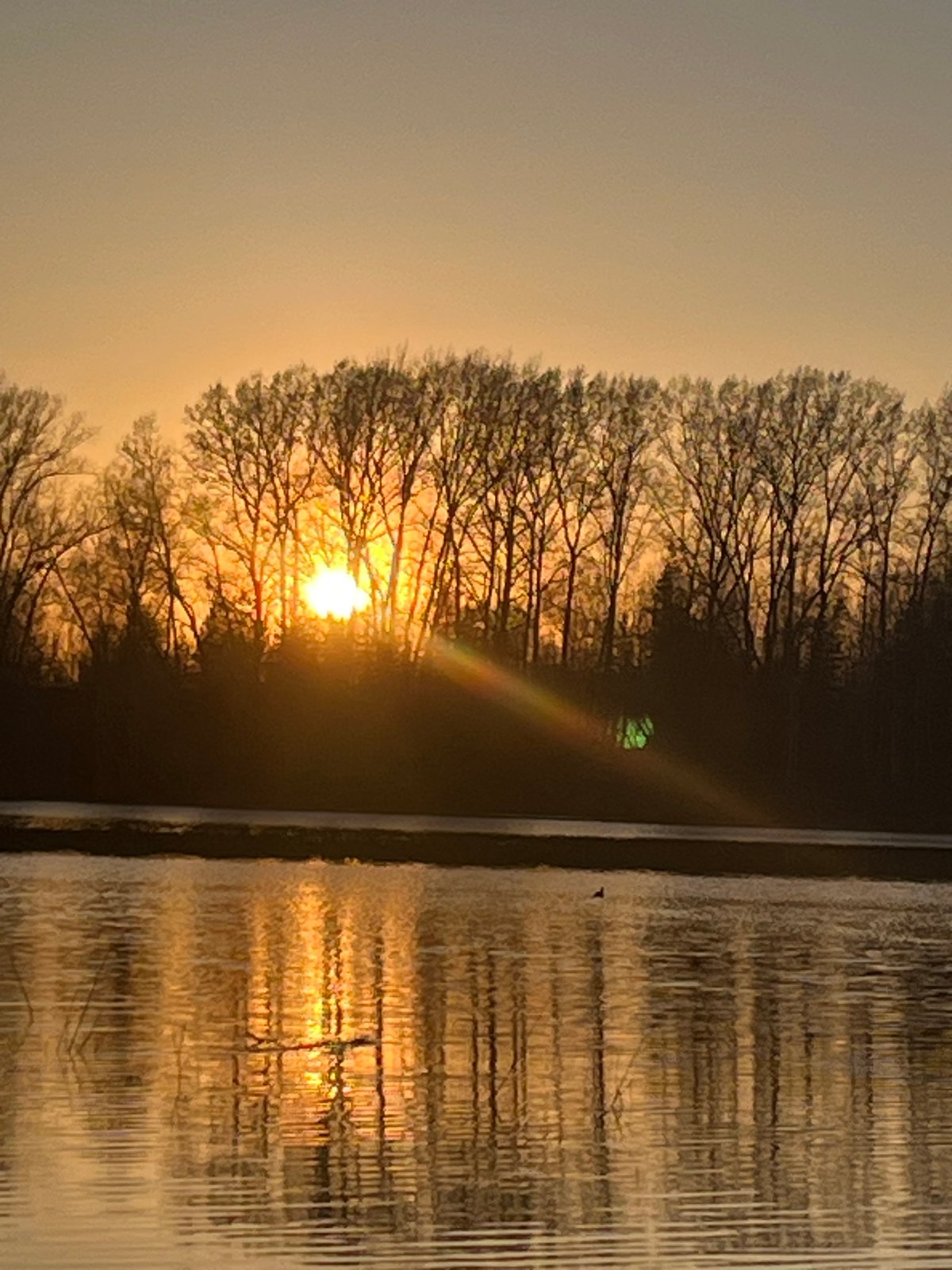 Sunset captured over water in Chaikovsky, Russia