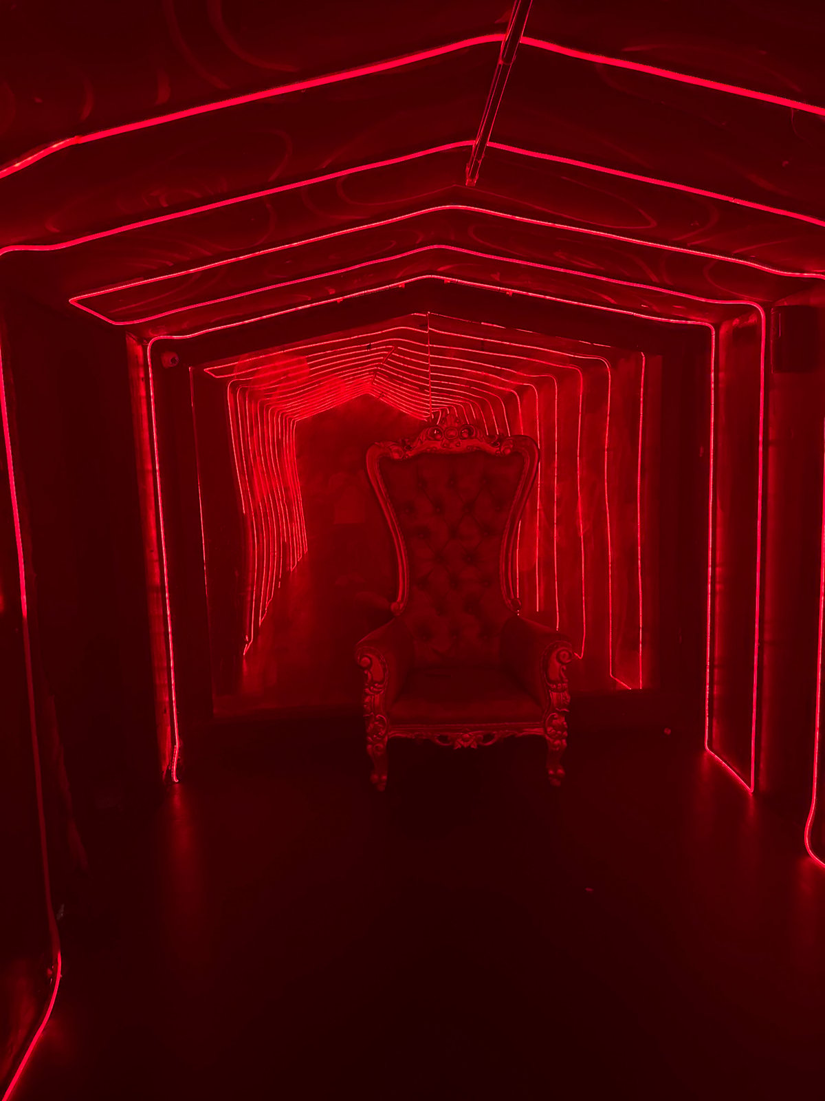 DJ performs with red laser show at North Kuta nightclub