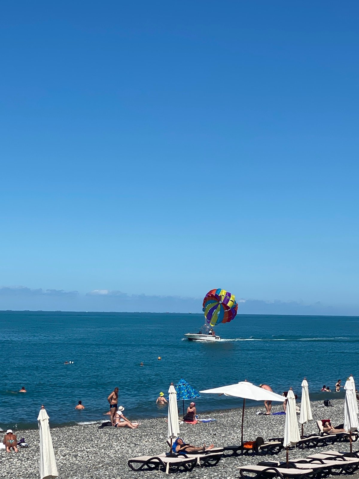 Parasailing and paddleboarding on Sochi's Black Sea beach