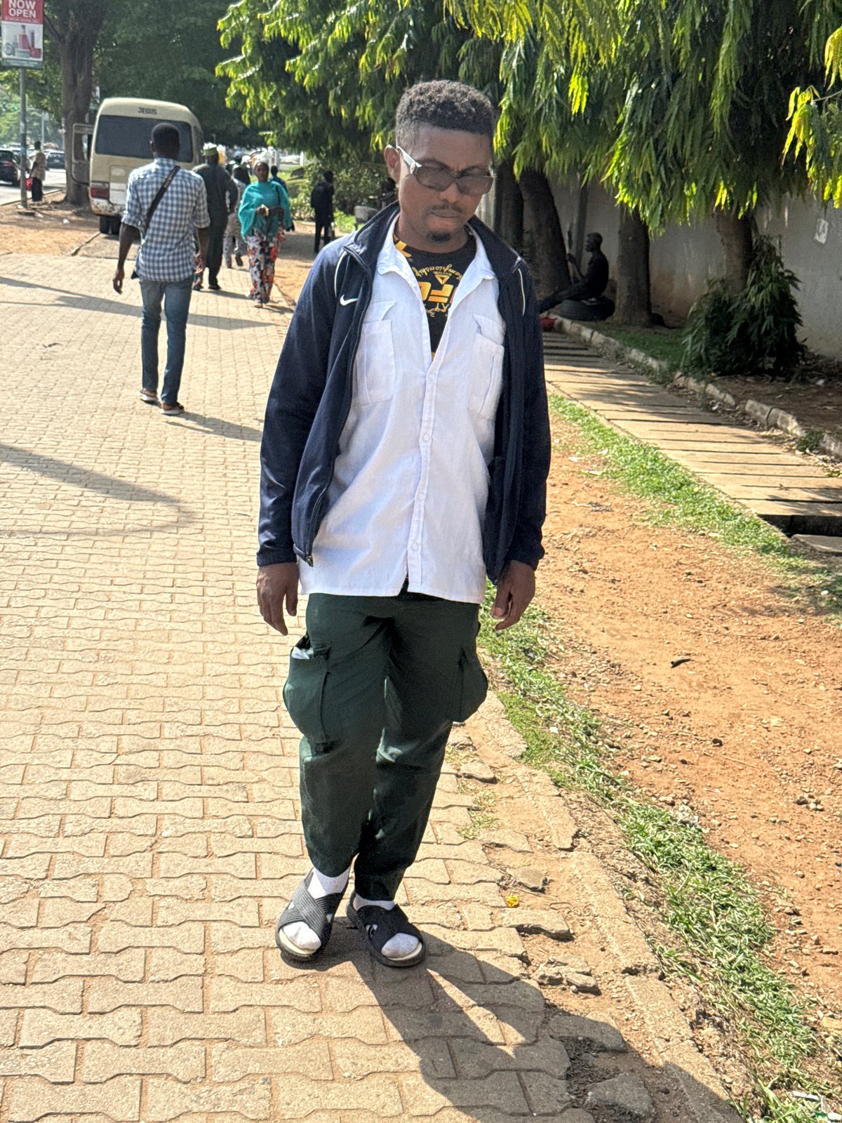 Morning street life documented across Abuja neighborhoods