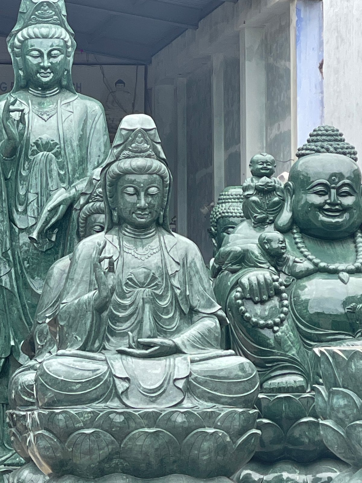 Intricately carved jade Buddha statues on display in Đà Nẵng