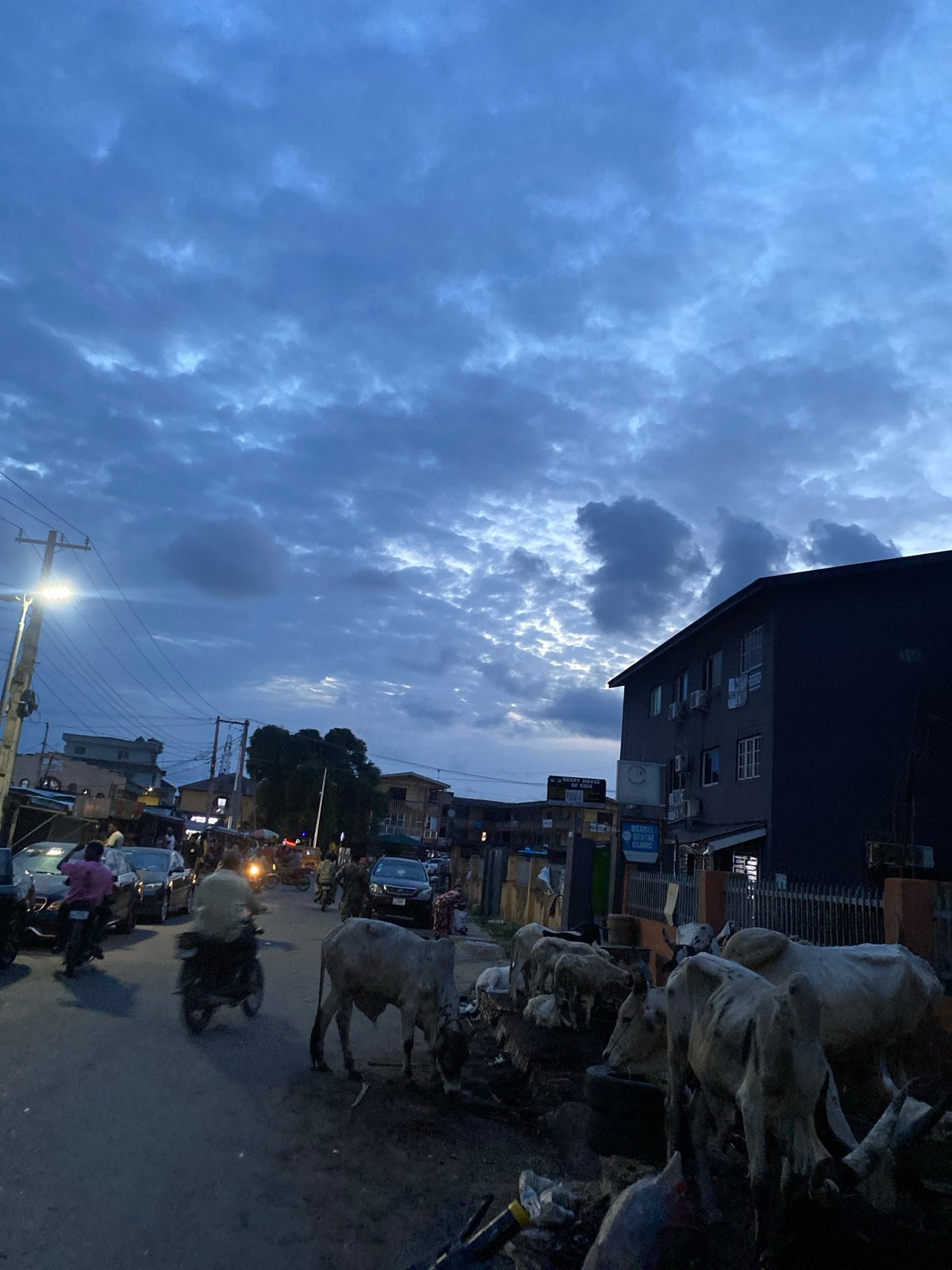 Evening documentation captures Lagos street scenes and electronic devices