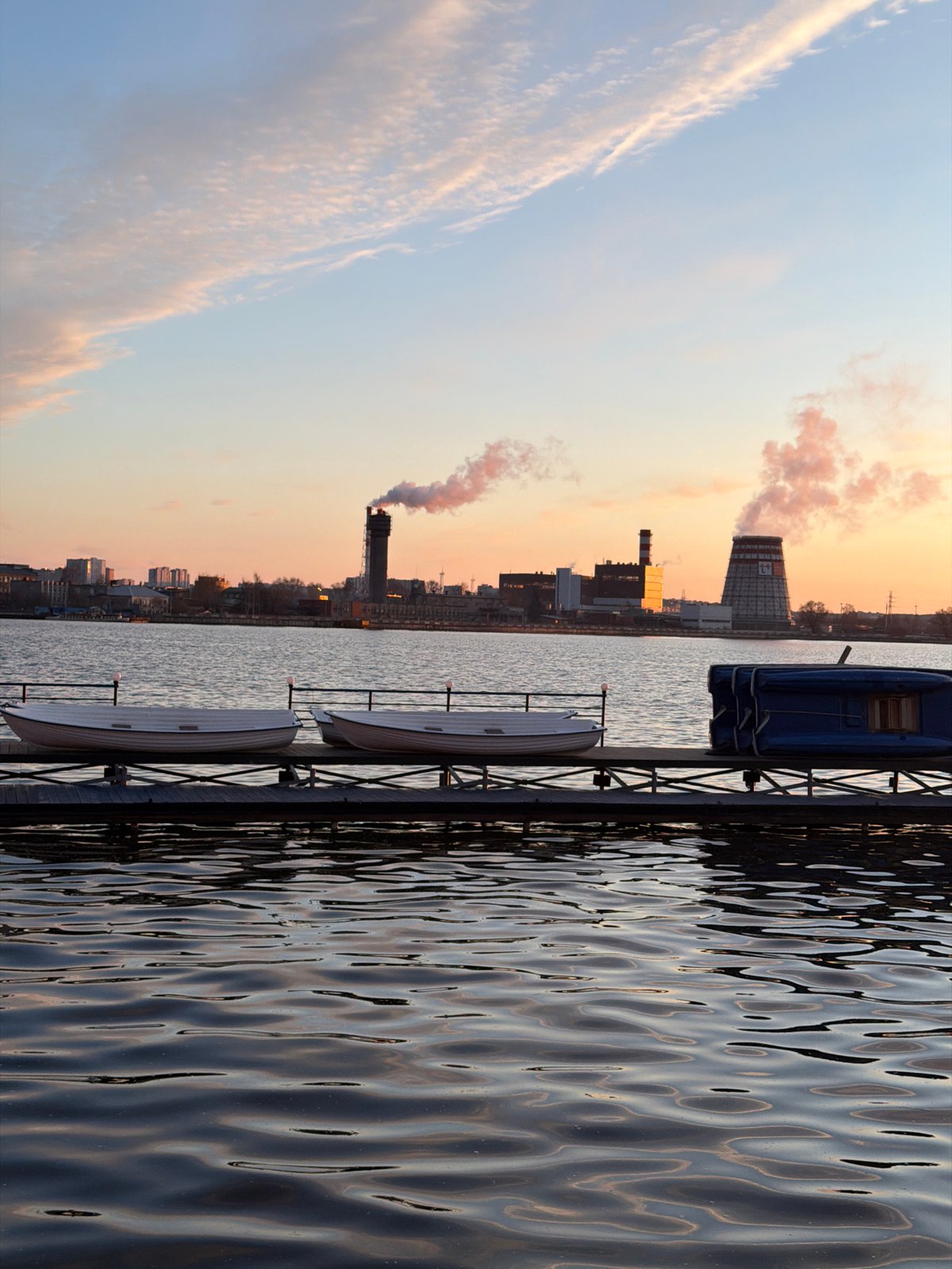 Golden hour sunset documented across Izhevsk waterfront and cityscape