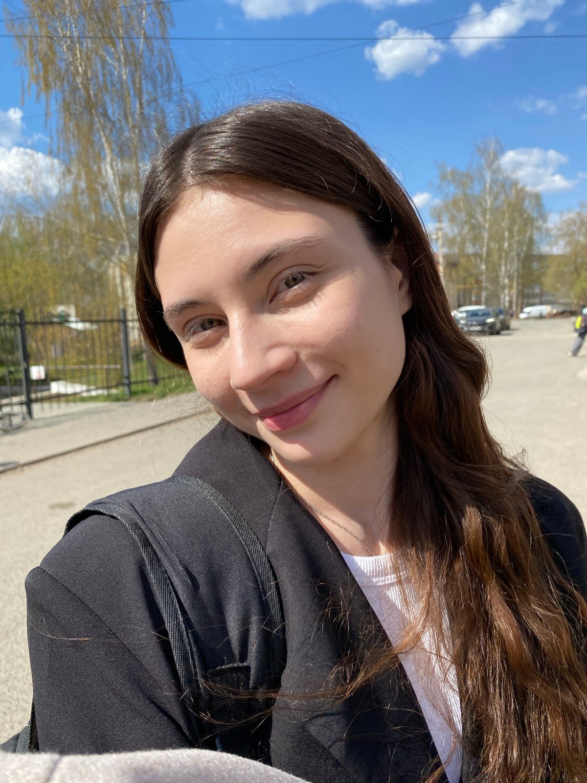 Woman takes selfies in Votkinsk park during morning outing