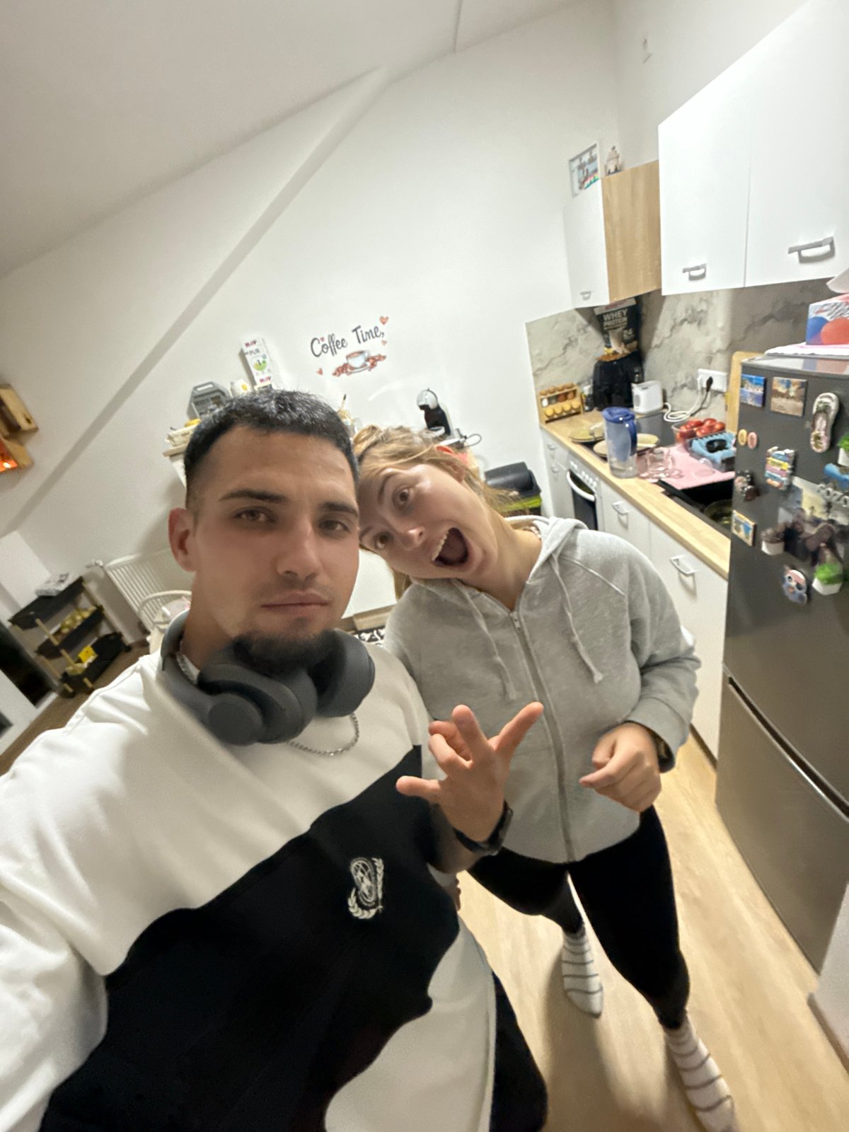 Young man's evening photo session in Garmisch-Partenkirchen apartment
