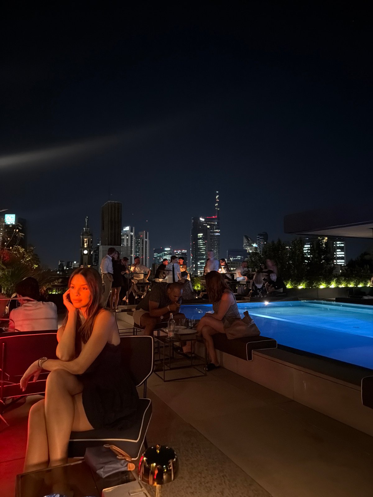 Rooftop bar night out with Milan skyline views