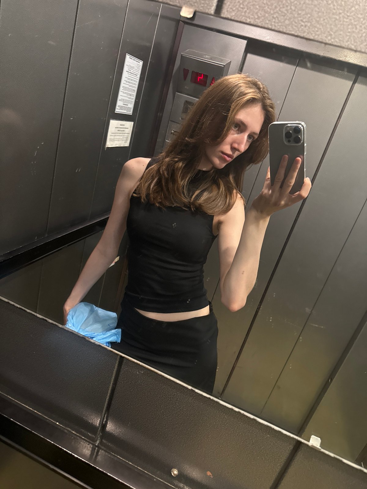 Elevator selfie and shoe detail in Perm, Russia
