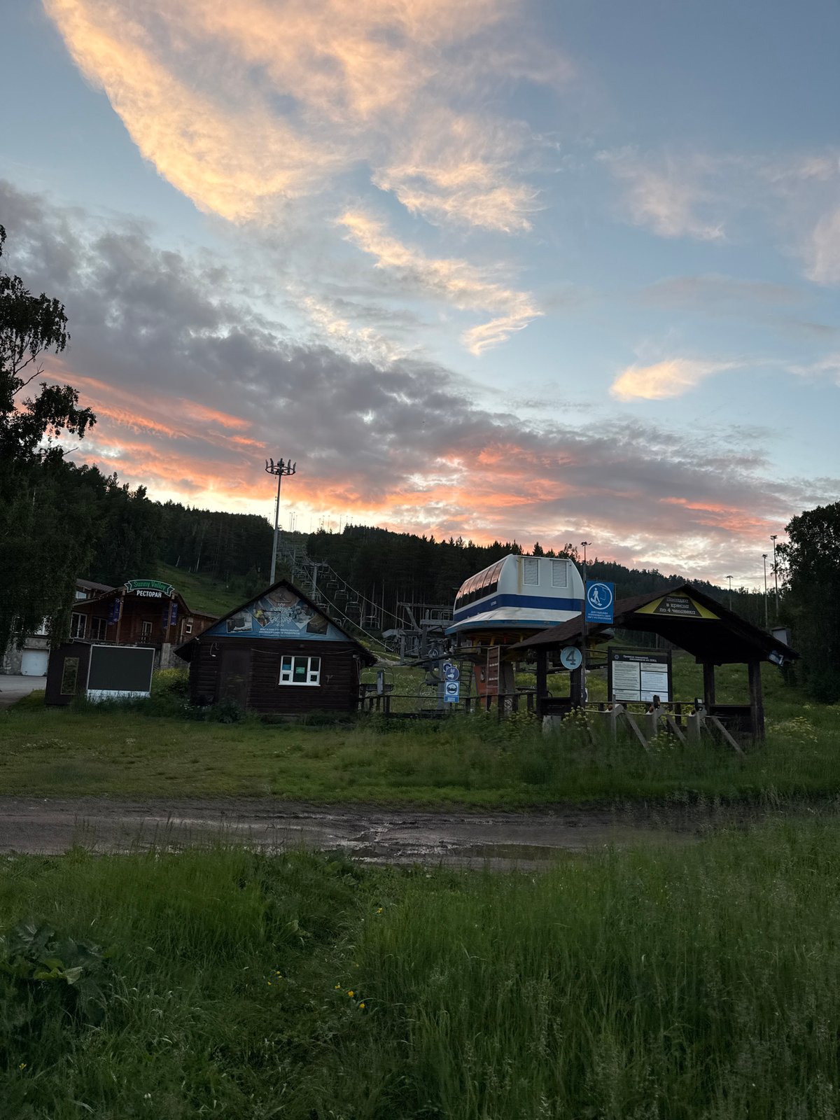 Wooden resort village in Syrostan, Russia, on a rainy summer afternoon