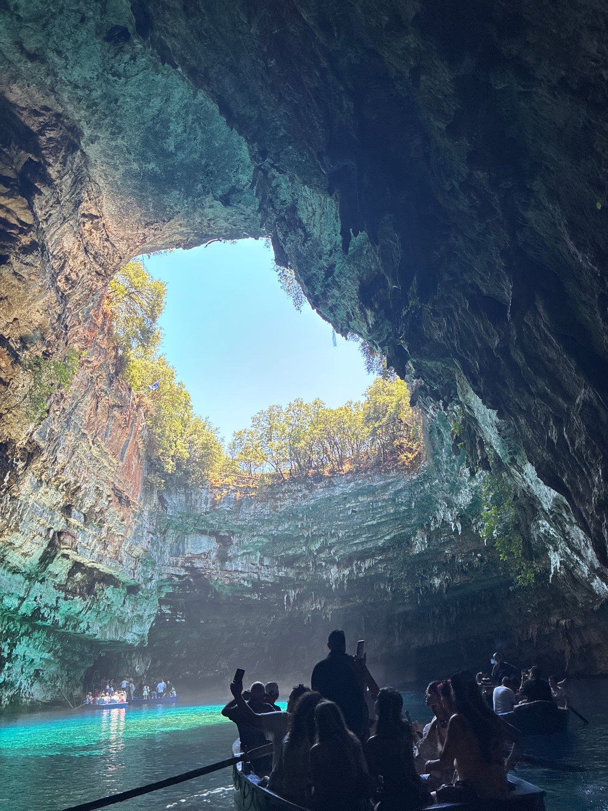 Melissani Cave's glowing waters and rocky interior, Kefalonia