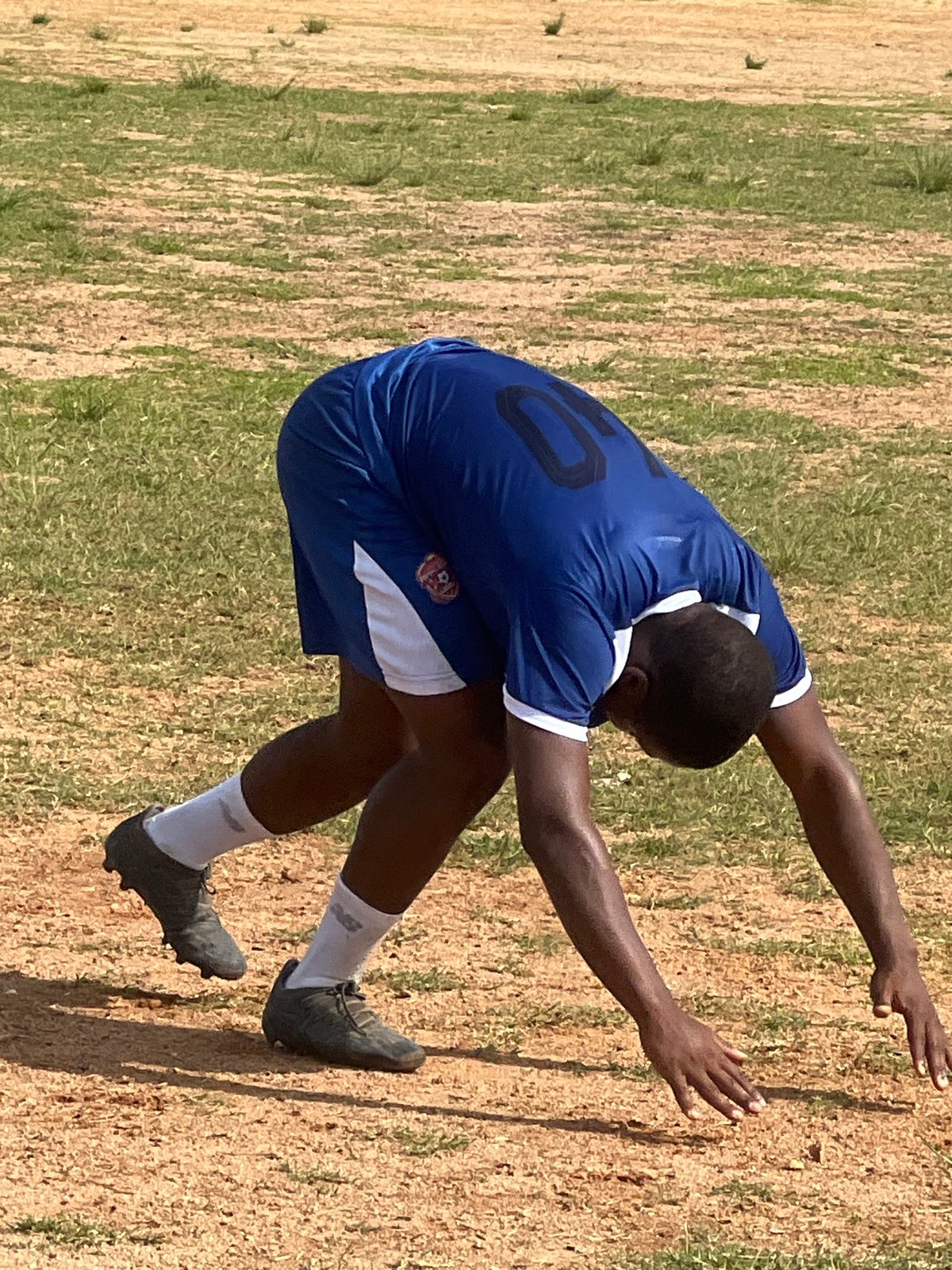 New Hope FC trains on a grass field in Jos, Nigeria