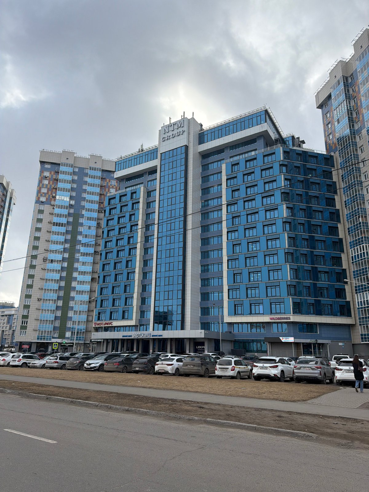 Urban street scene with high-rises observed in Krasnoyarsk