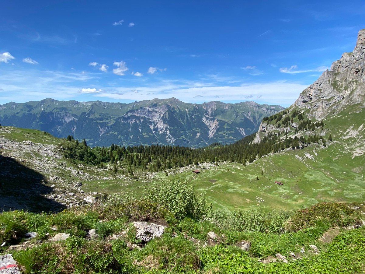 Alpine hiking adventure above Brienz with panoramic Swiss valley views