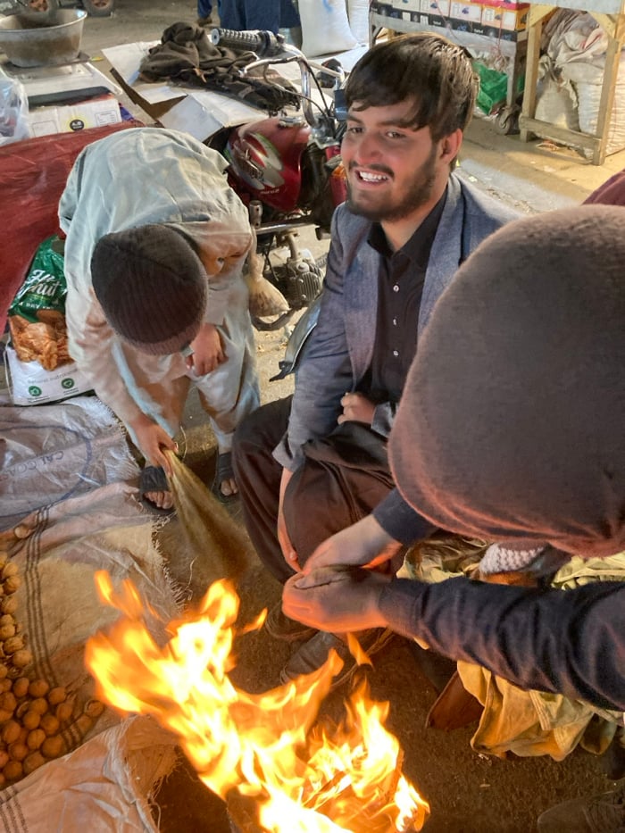 Vendors tend fire at Quetta marketplace amid nuts, dried fruits