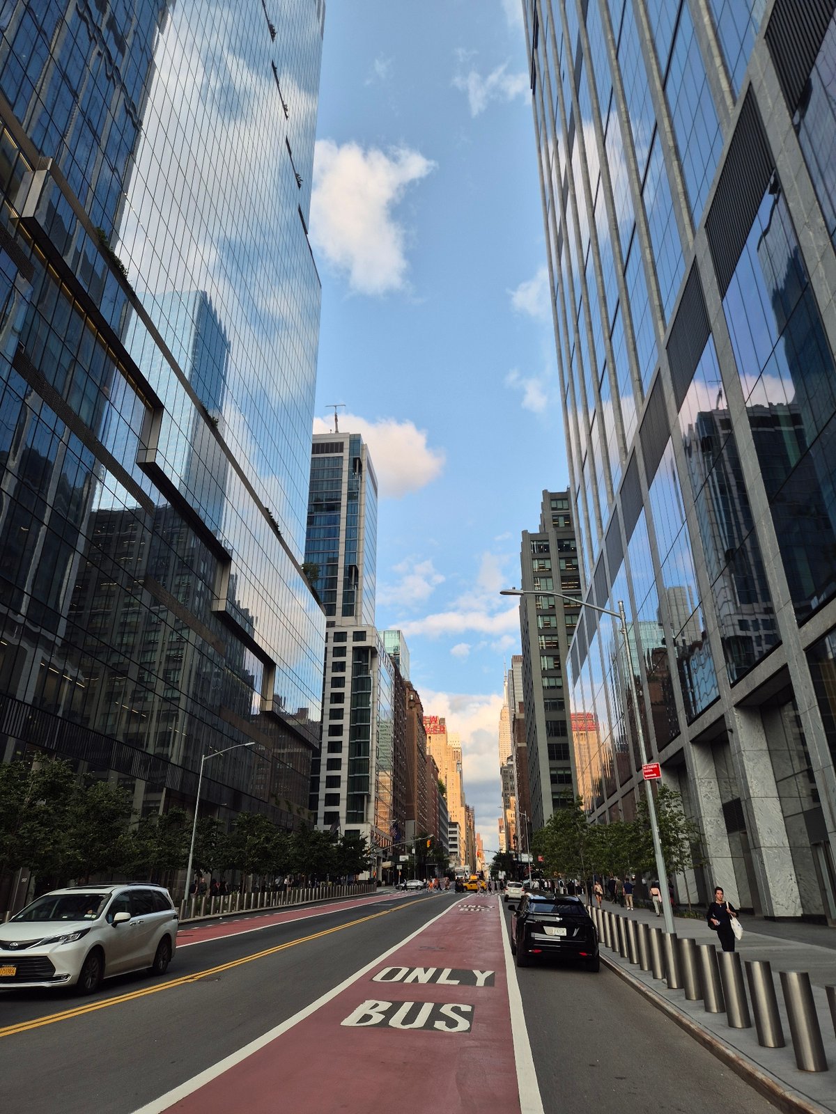 Street-level scenes around Hudson Yards on a summer evening