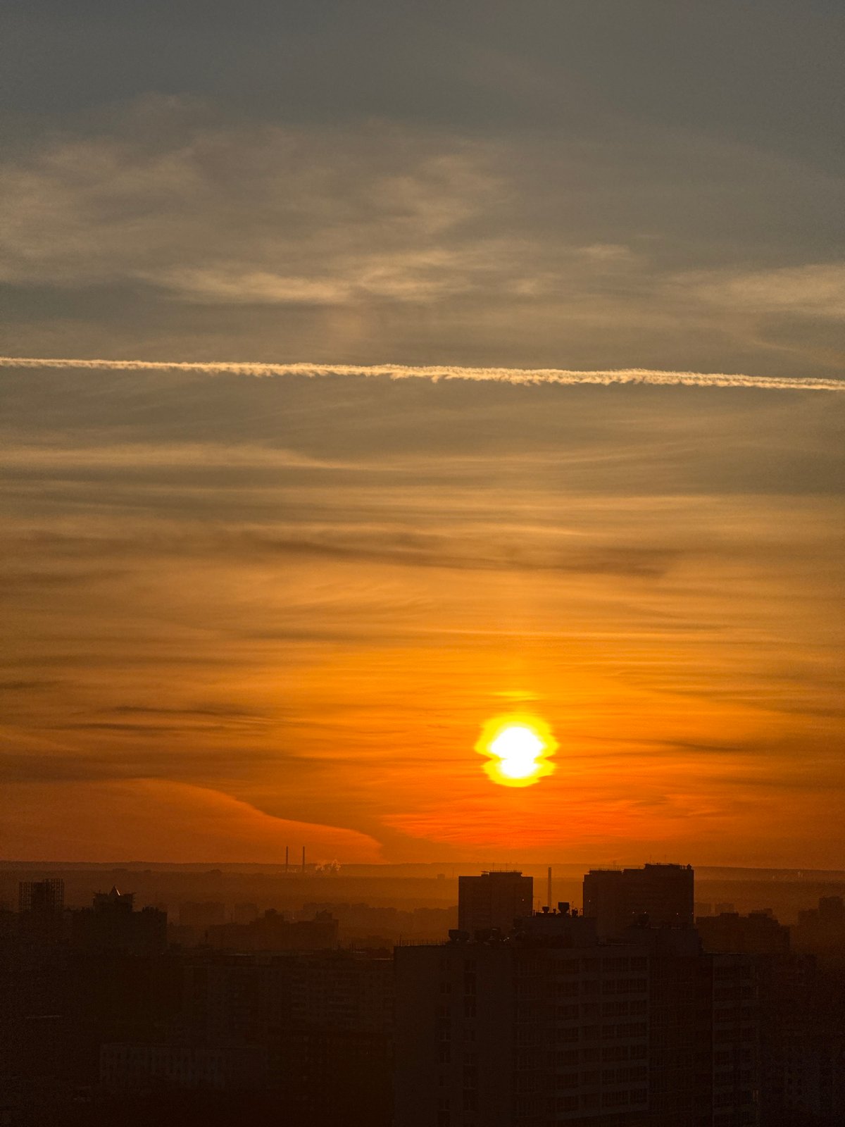 Dramatic sunrise captured over Perm, Russia urban landscape