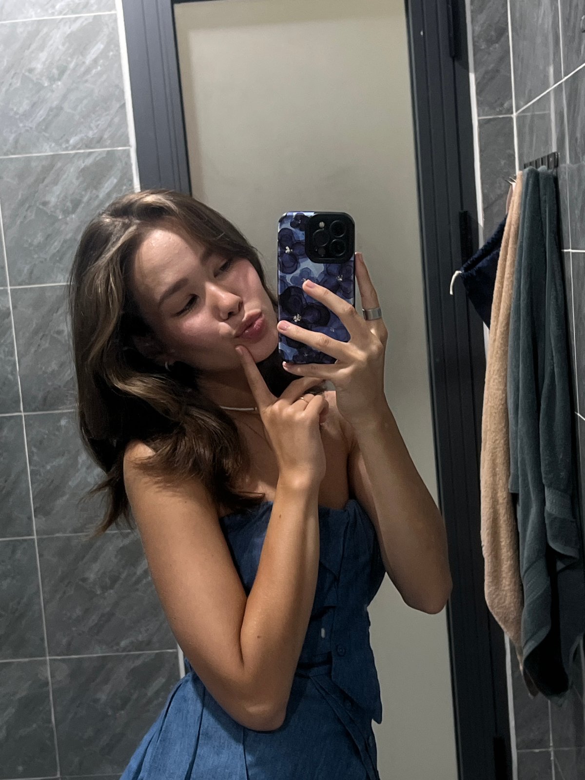 Woman takes bathroom selfie in Nam Nha Trang Ward