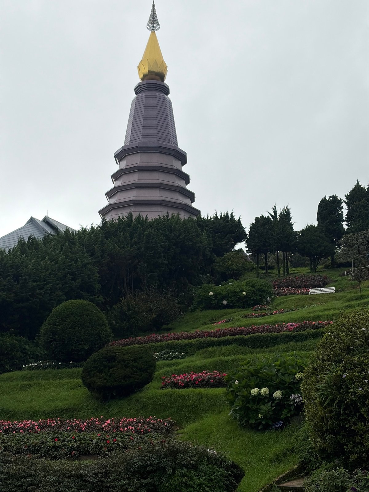 Misty morning at Doi Inthanon's summit shrines and viewpoints