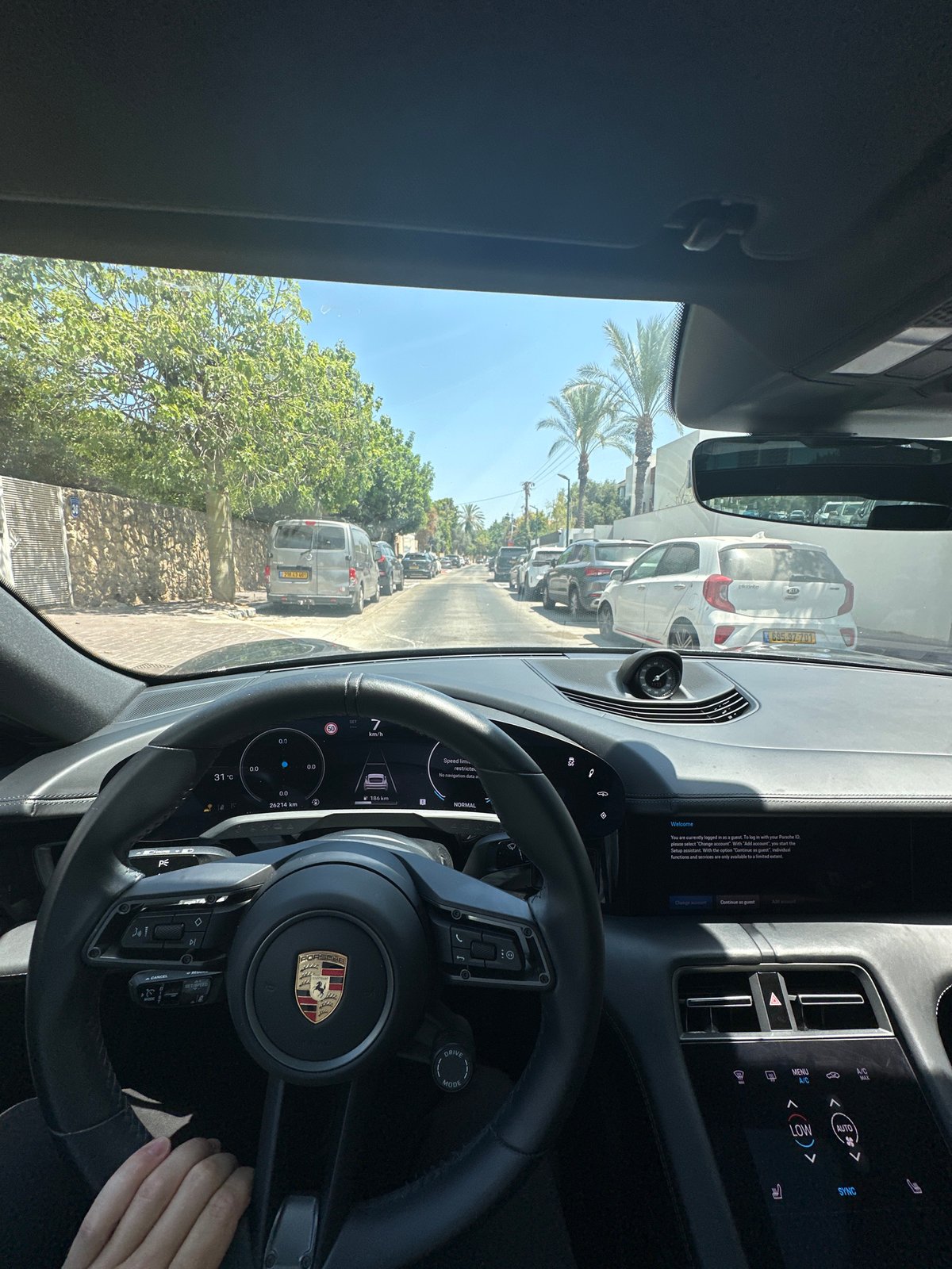Behind the wheel of a Porsche in Herzliya, Israel