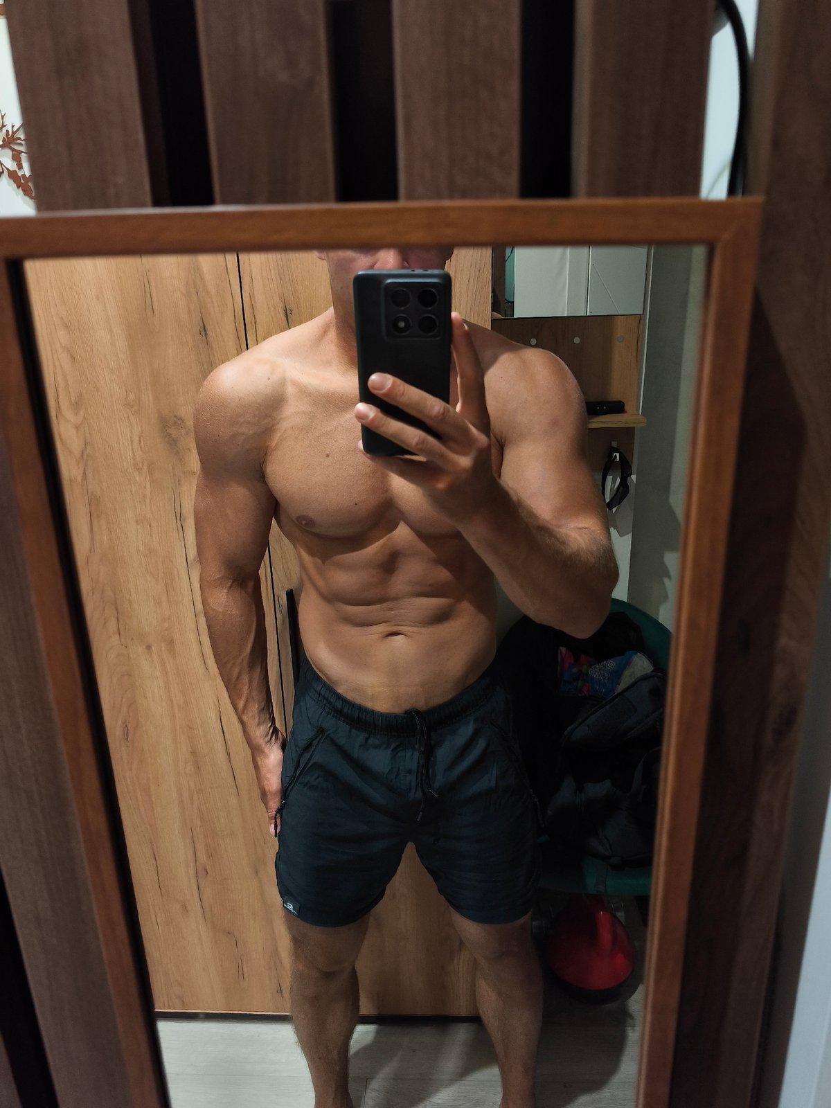 Man takes multiple selfies in Moscow building hallways