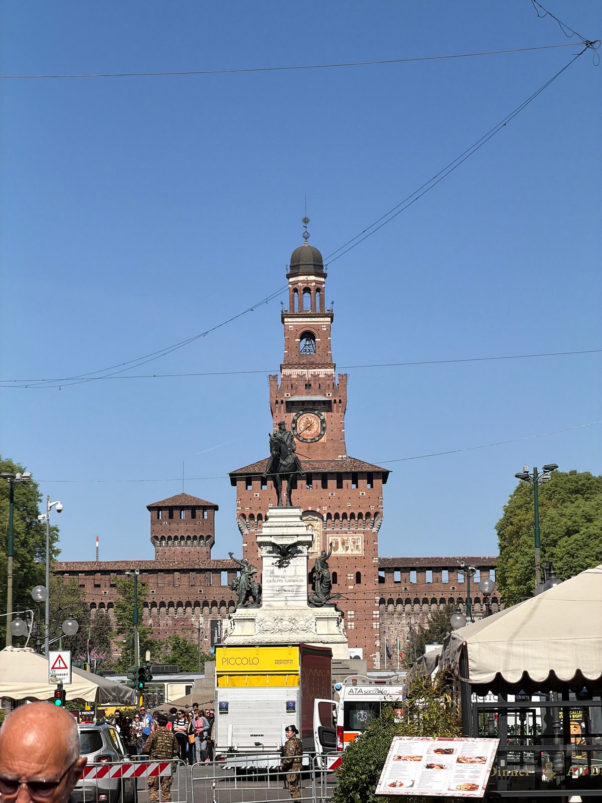 Morning Views of Milan's Sforza Castle and Needle Sculpture