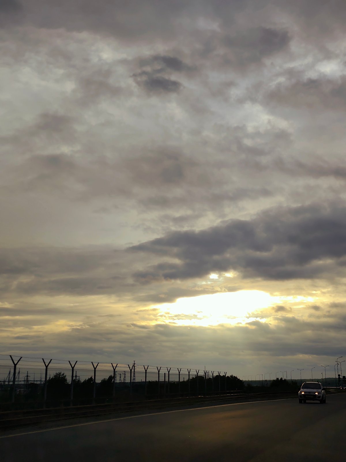 Overcast highway conditions documented in Chaikovsky, Russia