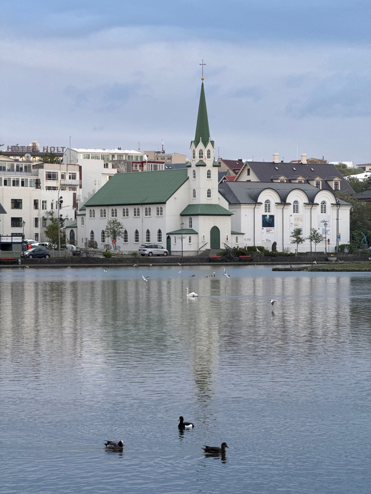 Evening scenes documented around Tjörnin lake in central Reykjavik