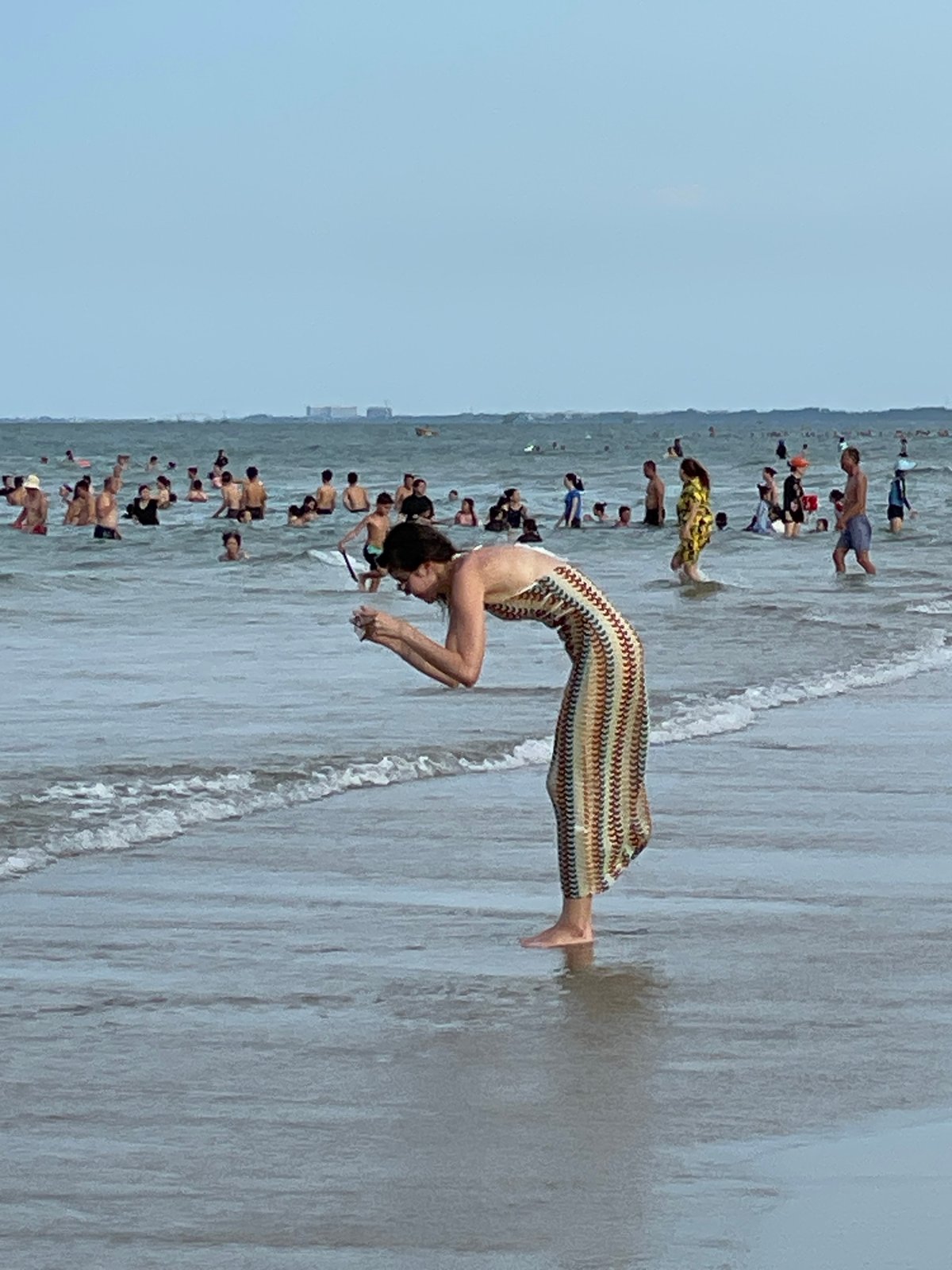 Busy beach day in Đà Nẵng, water sports and crowds in full swing