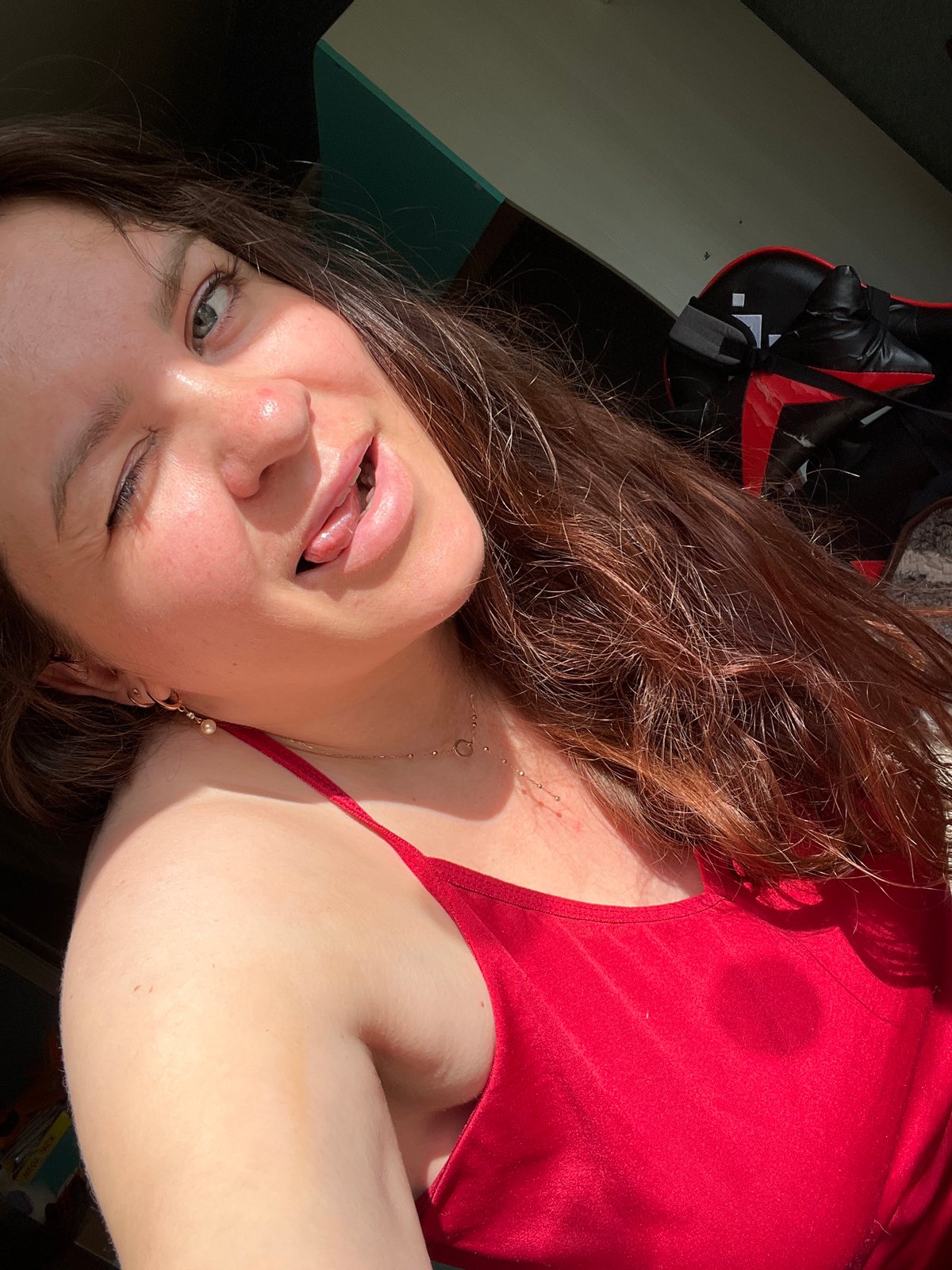 Playful selfie session in Noviy, Russia, mid-afternoon.