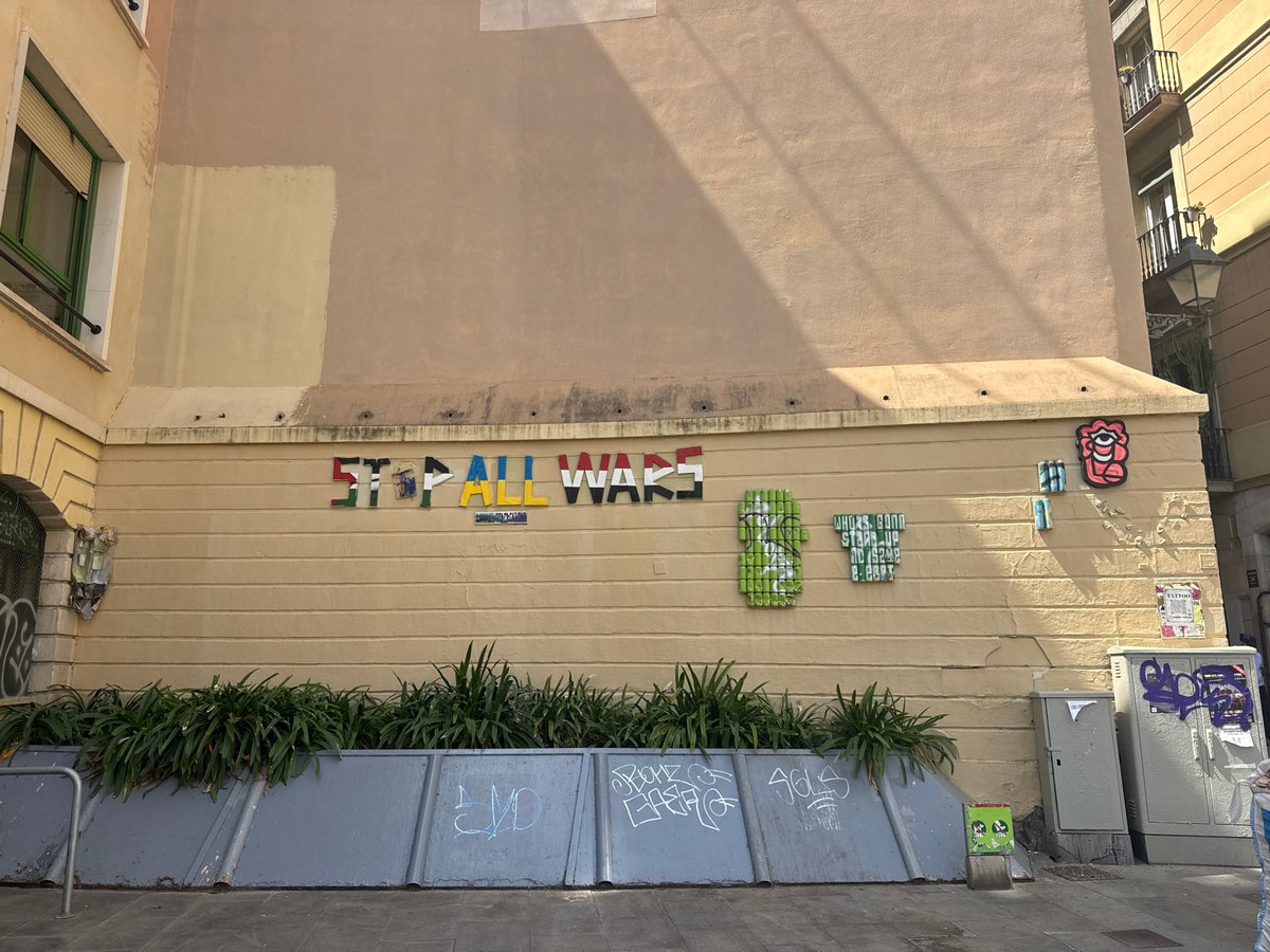 Barcelona street scenes include emergency response, architecture, street art