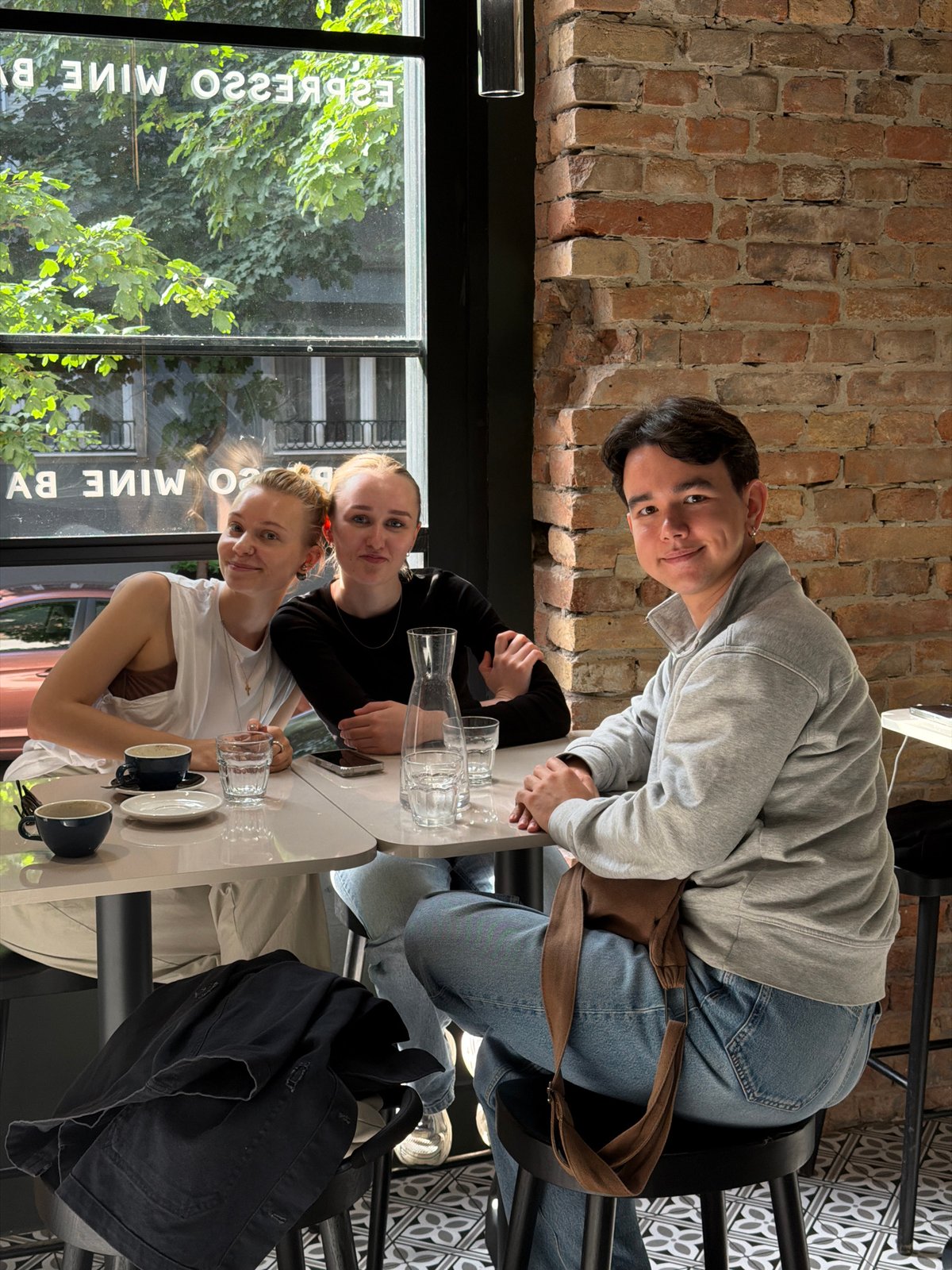Young man photographed during afternoon café visit in Belgrade
