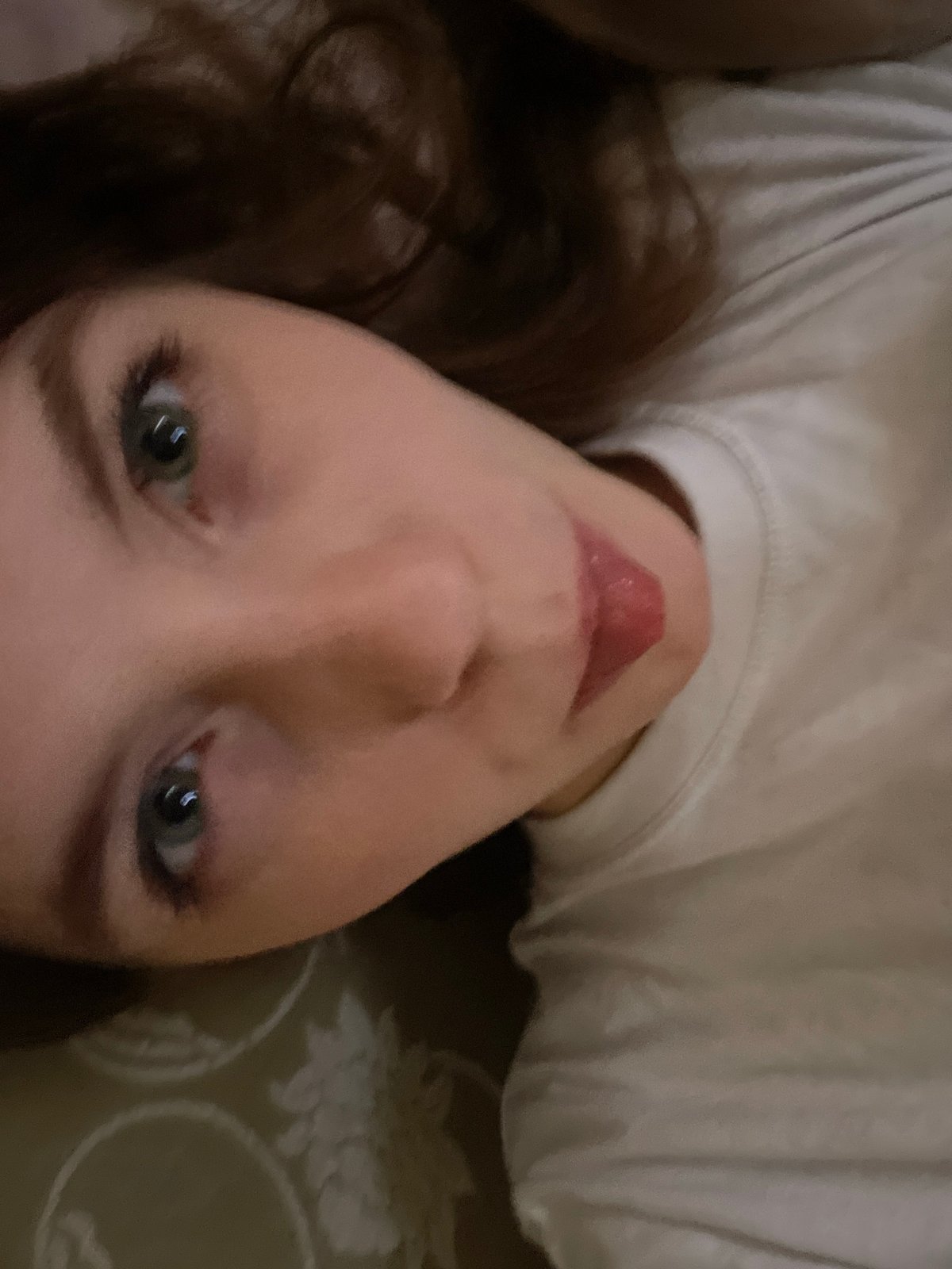 Woman photographed in apartment during quiet afternoon in Ufa