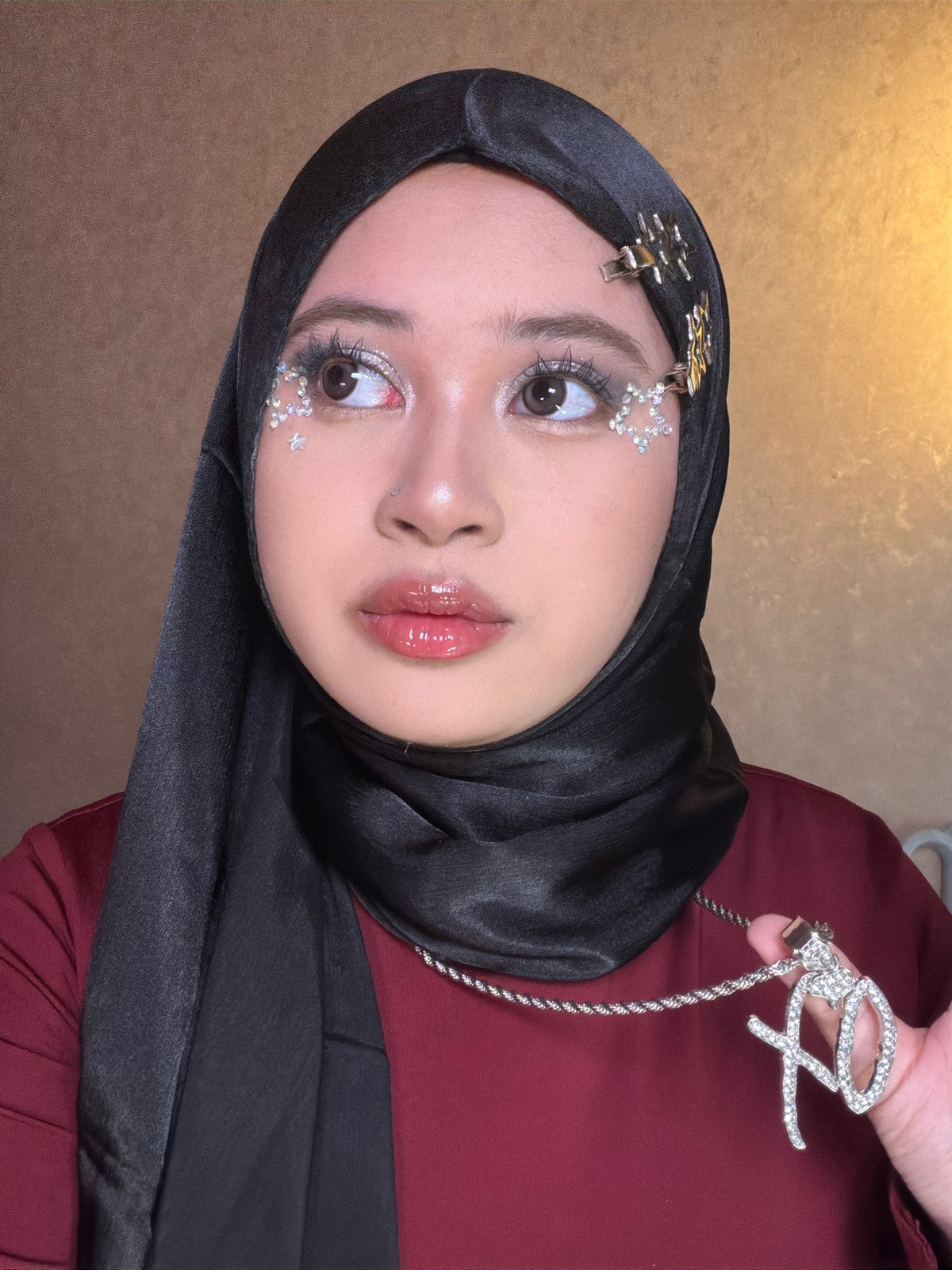 Glam makeup session in East Jakarta with rhinestones and glitter