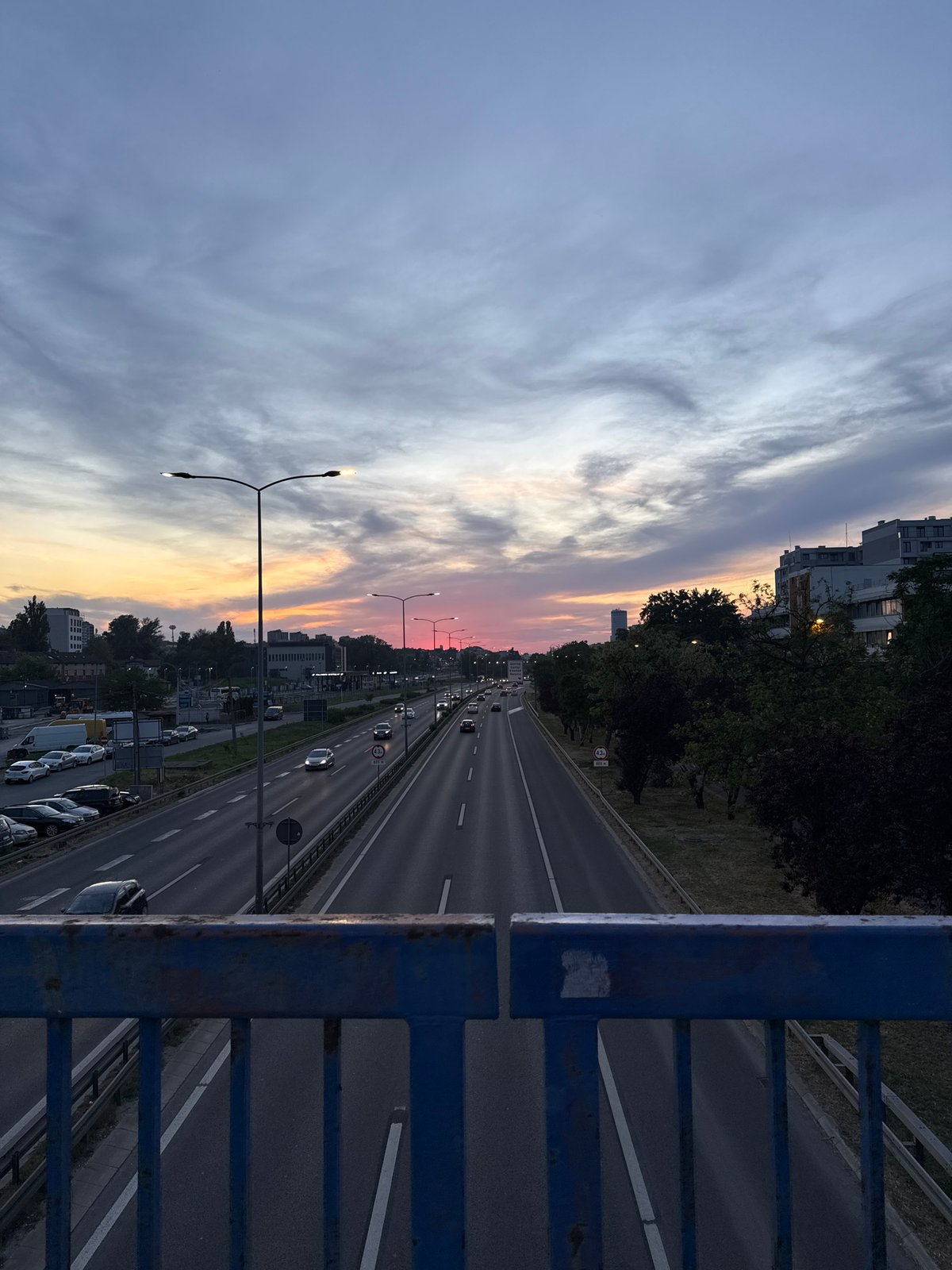 Evening highway traffic observed from bridge in Belgrade suburb