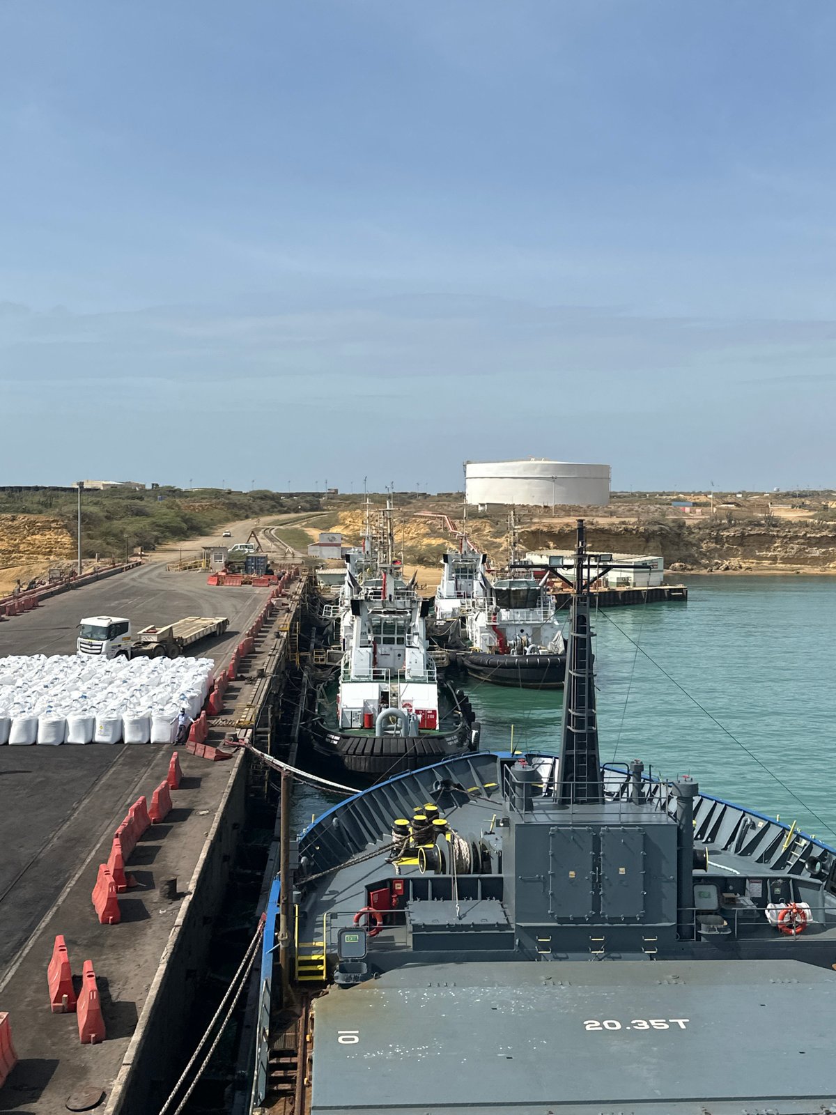 Cargo ship with bulk containers documented at Uribia port