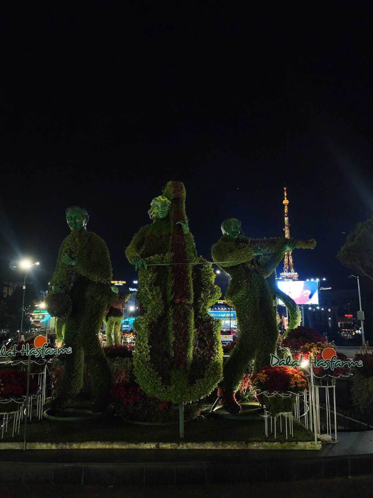 Nighttime scenes captured across illuminated Da Lat, Vietnam attractions