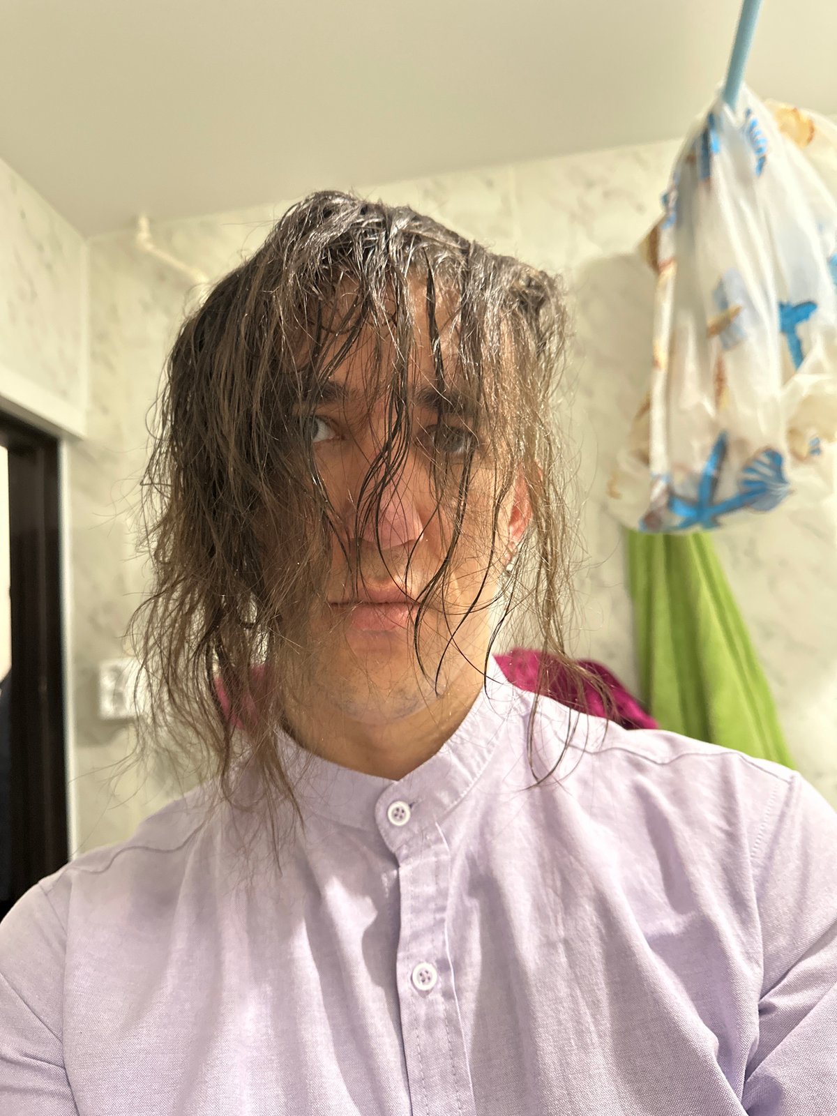 Man takes morning selfies while getting ready in Saratov