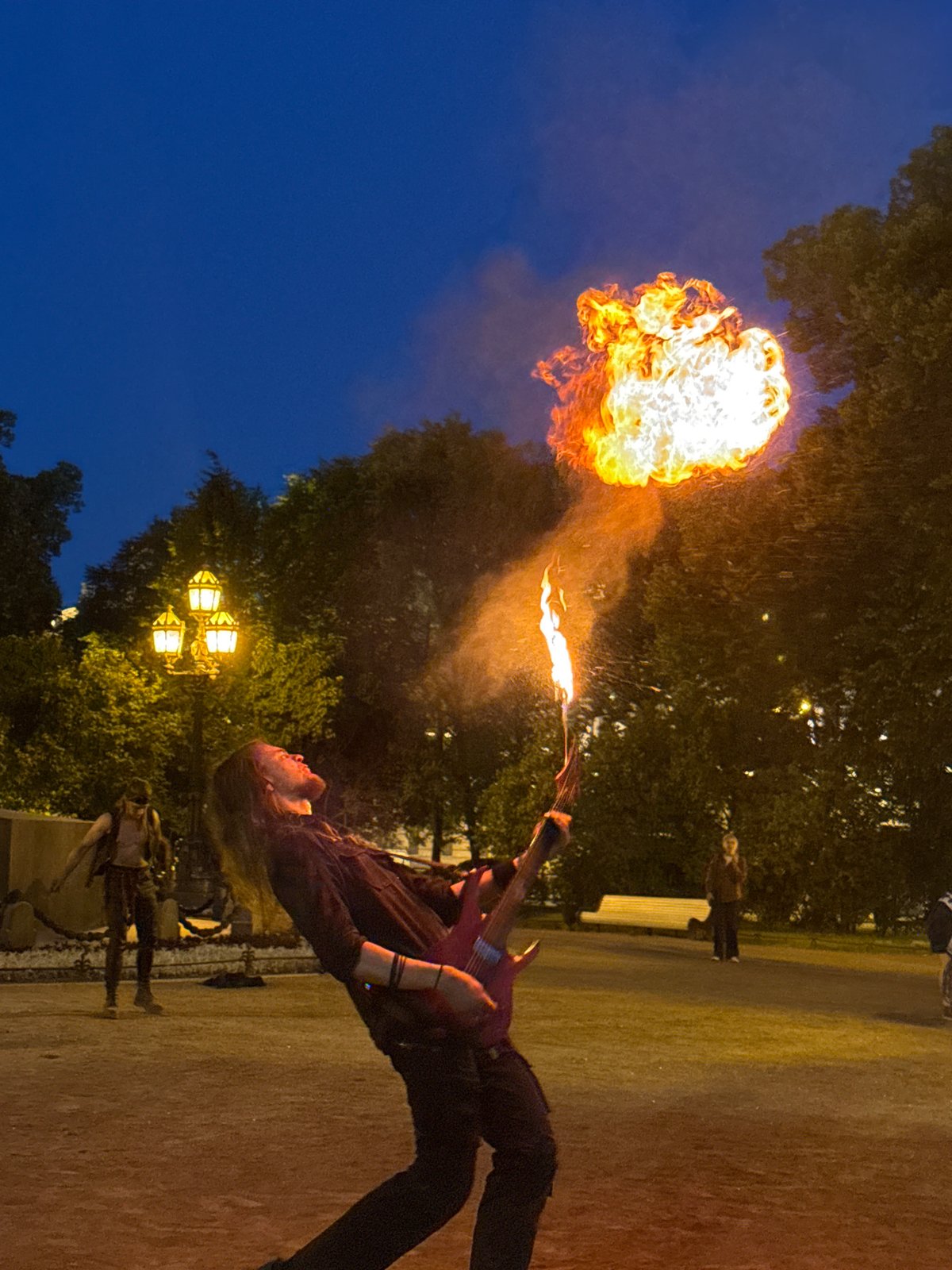 Fire performers take over Saint Petersburg's landmark squares at dusk