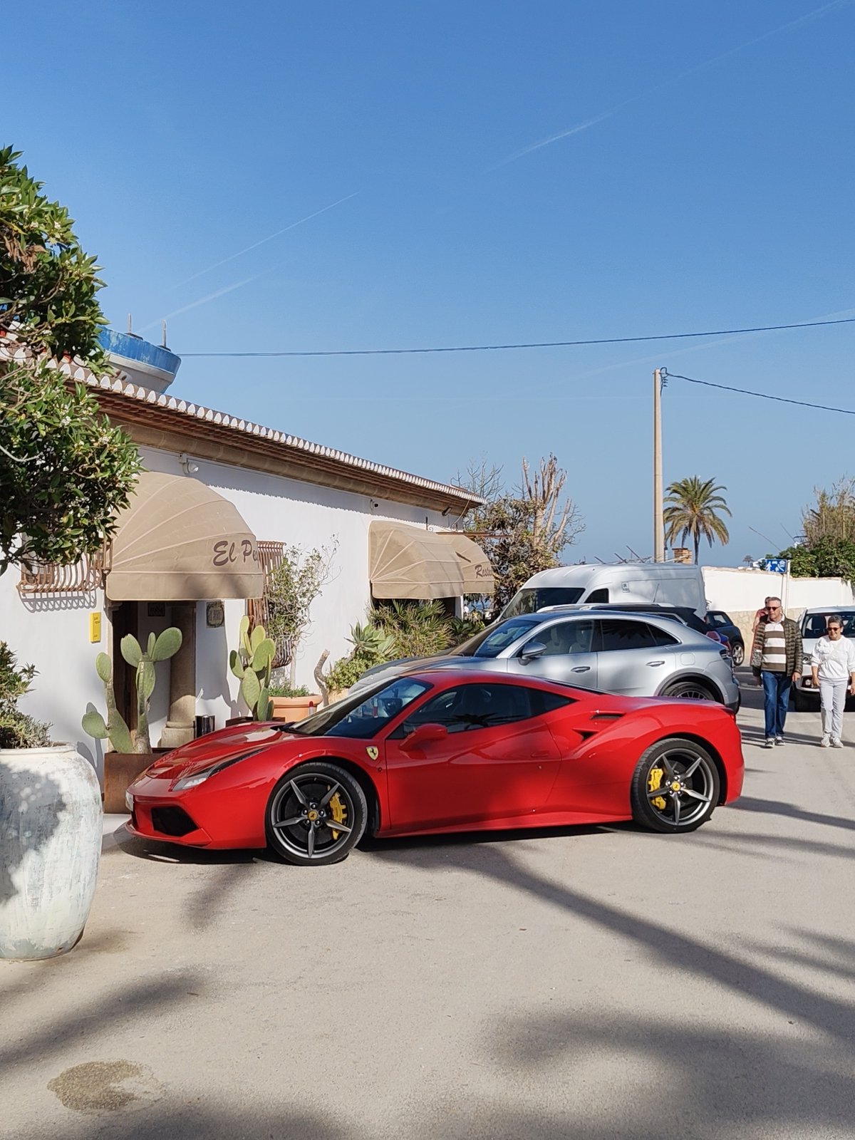 Afternoon stroll captured along Dénia's coastal promenade