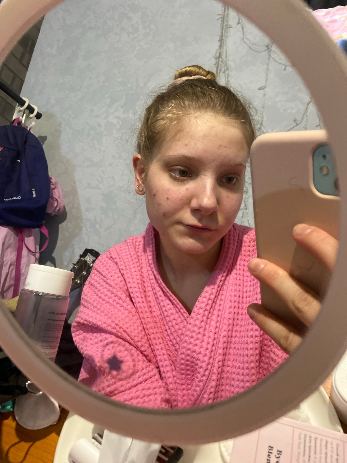 Woman documents skincare routine in mirror selfies in Chaikovsky